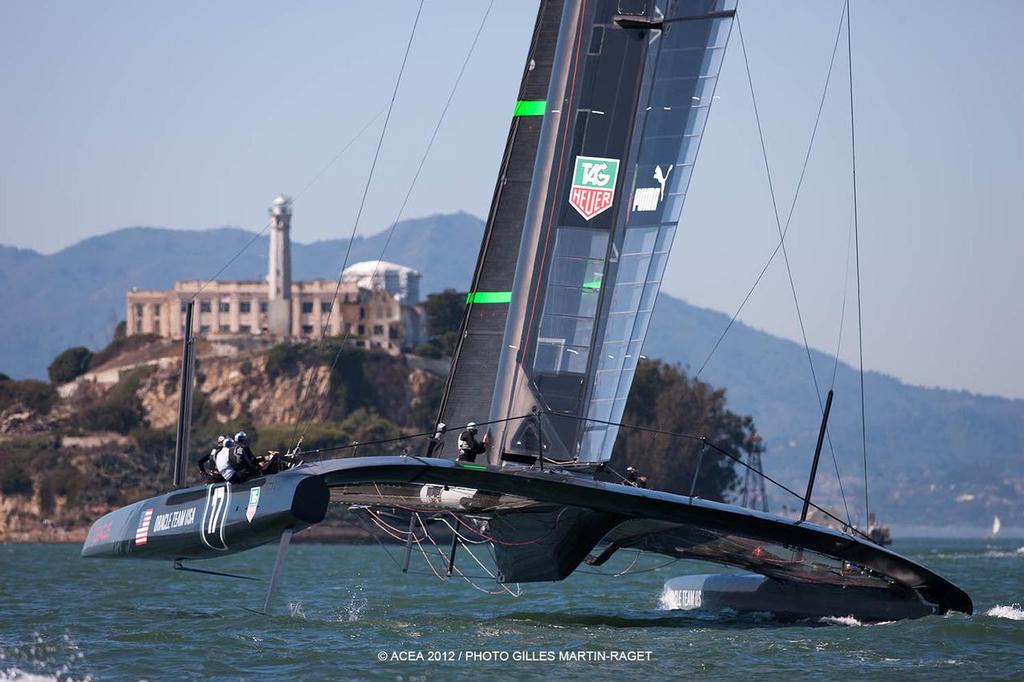 It is claimed that Oracle Team USA crew members pumped the wingsail sheet to lift the AC72 quickly onto her foils photo copyright ACEA - Photo Gilles Martin-Raget http://photo.americascup.com/ taken at  and featuring the  class
