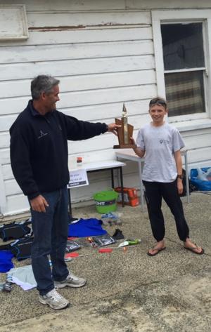 Russell Coutts presents Will Hadfield with the South Island Championship trophy photo copyright Doyle Sails NZ taken at  and featuring the  class