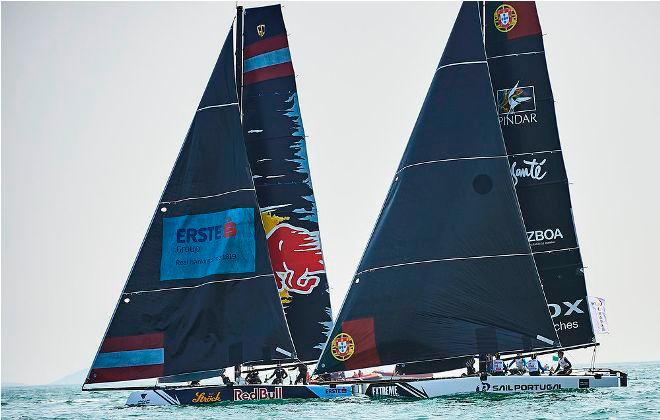 Red Bull Sailing Team and Sail Portugal go head to head during the only race of the opening day in Qingdao, China. © Aitor Alcalde Colomer