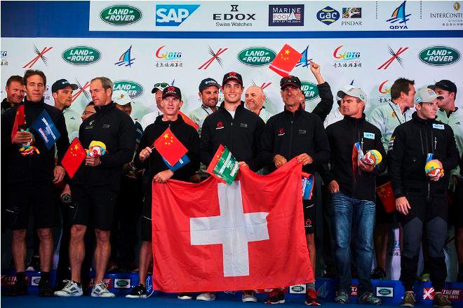Act two champions Alinghi at the prize giving ceremony after a spectacular showdown in Qingdao. © Aitor Alcalde Colomer