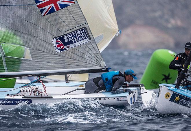 Giles Scott inspects the damage to his Finn rudder © Ocean Images/British Sailing Team