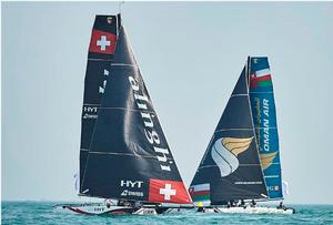 Alinghi and Oman Air on the water on day one of racing in Qingdao. Act one champions Oman Air finish in seventh for the day with Alinghi in third. photo copyright Aitor Alcalde Colomer taken at  and featuring the  class