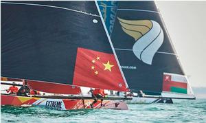 The home flagged team and Oman Air neck-and-neck on day one of racing in Qingdao. photo copyright Aitor Alcalde Colomer taken at  and featuring the  class