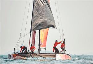 The first Chinese-flagged team to compete in a full season on the water on the first day of racing in Act two, Qingdao. photo copyright Aitor Alcalde Colomer taken at  and featuring the  class