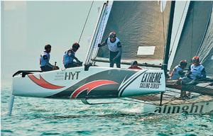 Champions of day two, Act two, Alinghi, fly a hull on the waters of Fushan Bay. photo copyright Aitor Alcalde Colomer taken at  and featuring the  class