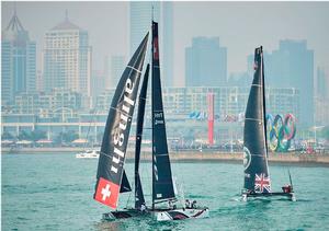 Alinghi and Land Rover BAR Academy during a race on the penultimate day in China photo copyright Aitor Alcalde Colomer taken at  and featuring the  class