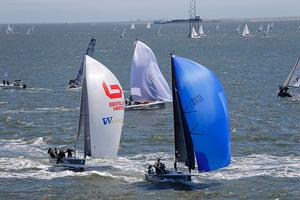 The fastest boats on the inshore course are the GP26s, seen locked in battle here just off the Battery on Day 2 of Sperry Charleston Race Week. photo copyright Tim Wilkes taken at  and featuring the  class