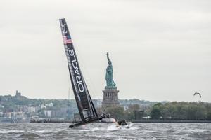 Lady Liberty presiding over action in the water - 2016 America's Cup World Series photo copyright Sam Greenfield/Ricardo Pinto/Red Bull Content Pool taken at  and featuring the  class