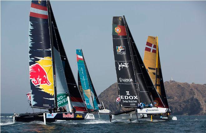 The fleet foil in close quarters in front of the Old Town on day one of racing in Muscat, Oman - 2016 Extreme Sailing Series © Lloyd Images