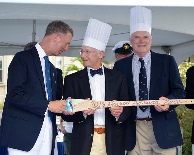 Thomas Vander Salm and John Browning from the double hander WHISPER, awarded the Galley Slave trophy for last to finish by His Excellency, The Governor of Bermuda, Geroge Fergusson. © Barry Pickthall / PPL