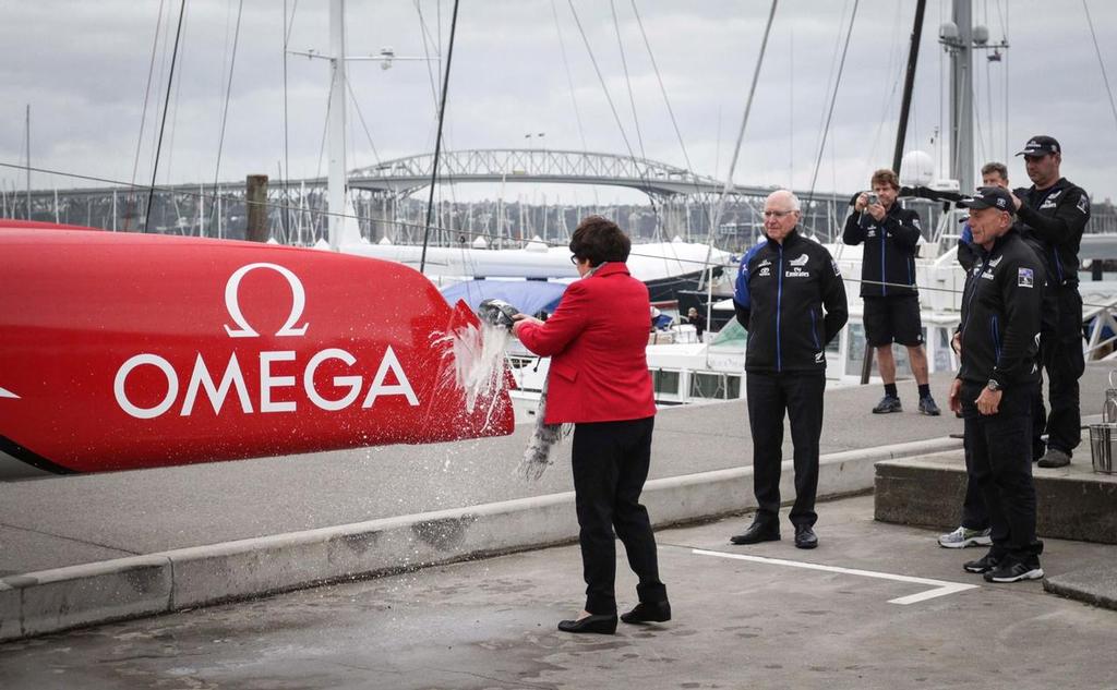 ETNZ Board member and one of the hosting agreement negotiators, Sir Stephen Tindall stands alongside CEO Grant Dalton as Lady Margaret Tindall spills the bubbly over the bows of ETNZ&rsquo;s AC45S in a naming ceremony before the boat went back in the shed for finishing, June 21, 2016 photo copyright Hamish Hooper/Emirates Team NZ http://www.etnzblog.com taken at  and featuring the  class