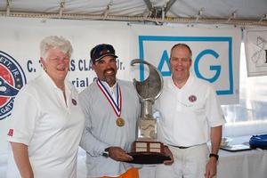 Winner of the C. Thomas Clagget, Jr. Trophy Julio Reguero with Judy McLennan and Bill Leffingwell photo copyright Billy Black http://www.BillyBlack.com taken at  and featuring the  class