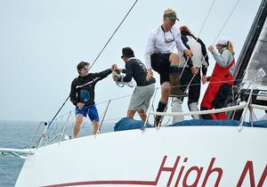 High Five! ... Young crew on HIGH NOON,  a Tripp 41 skippered by Peter Becker celebrating a remarkable line honors victory among the traditional yachts. photo copyright Barry Pickthall / PPL taken at  and featuring the  class