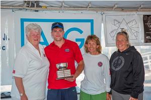 Josh Agripino winner of the Larry Gadsby trophy with Judy McLennan, Nancy Haberland and Betsy Alison photo copyright  Billy Black / Clagett Regatta taken at  and featuring the  class