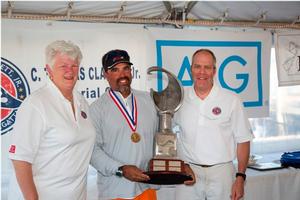 Winner of the C. Thomas Clagget, Jr. Trophy Julio Reguero with Judy McLennan and Bill Leffingwell photo copyright  Billy Black / Clagett Regatta taken at  and featuring the  class