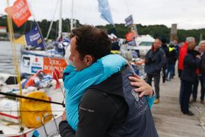A tired Nick Cherry hugs his Mum on the dock - 2016 Solitaire Bompard Le Figaro photo copyright Artemis Offshore Academy taken at  and featuring the  class