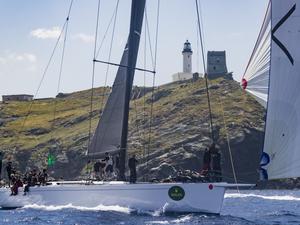 Lupa of London passes beneath the Giraglia lighthouse and the Genoese Tower - 2016 Giraglia Rolex Cup photo copyright Quinag taken at  and featuring the  class