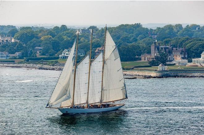 The 213-foot (65m) three-masted schooner Adix sails off Newport’s historic Cliff Walk during the Candy Store Cup © Rod R. Harris