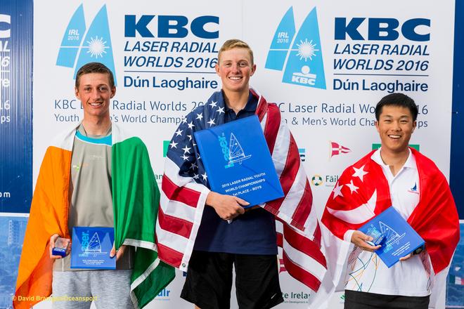 Dun Laoghaire Harbour, Saturday 30th July 2016:<br />
Laser Radial Youth World Champion Henry Marshall, United States (centre) with Ewan McMahon, Ireland (left) and Bernie Chin, Singapore (right) at the prize-giving for the KBC Laser Radial World Championships hosted by the Royal St. George Yacht Club and Dun Laoghaire Harbour.<br />
Photograph:  David Branigan/Oceansport © David Branigan/Oceansport http://www.oceansport.ie/
