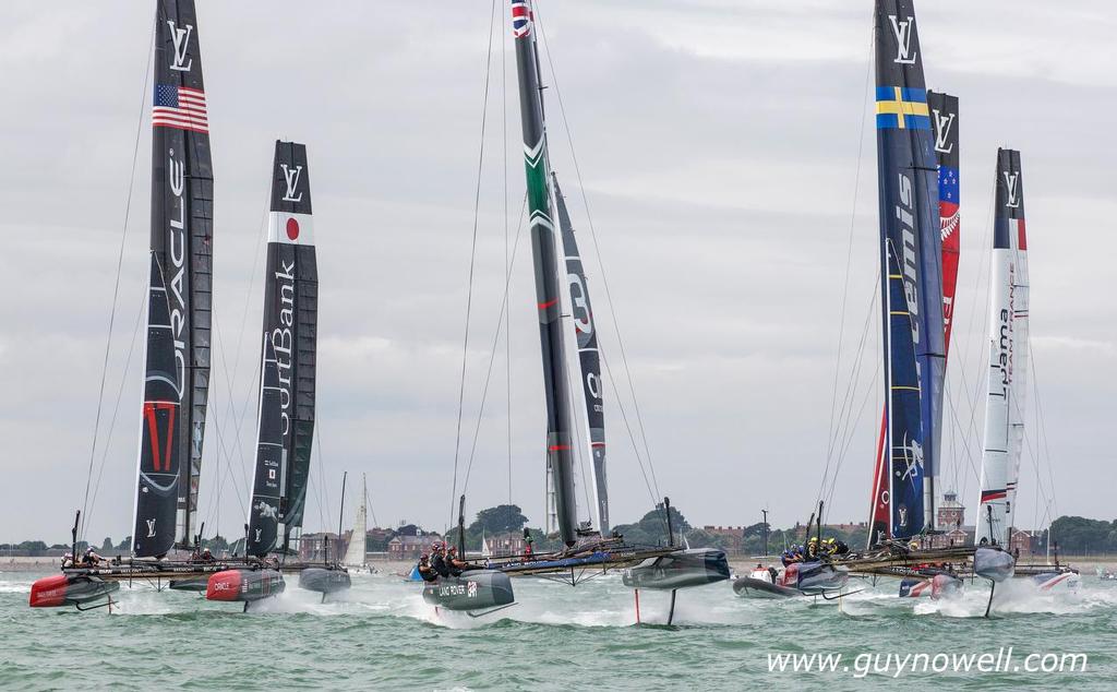 Incoming! Six AC45 heading into the first mark, and fast! Louis Vuitton America's Cup World Series Portsmouth 2016. photo copyright Guy Nowell http://www.guynowell.com taken at  and featuring the  class