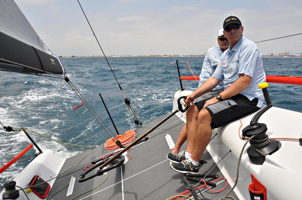 Arbitration Panel member Matt Allen (AUS) helming a new Farr400 in Valencia, with Grant Simmer (OTUSA) on tactics in 2011. photo copyright Pierre Orphanidis/VSail.info http://www.vsail.info taken at  and featuring the  class