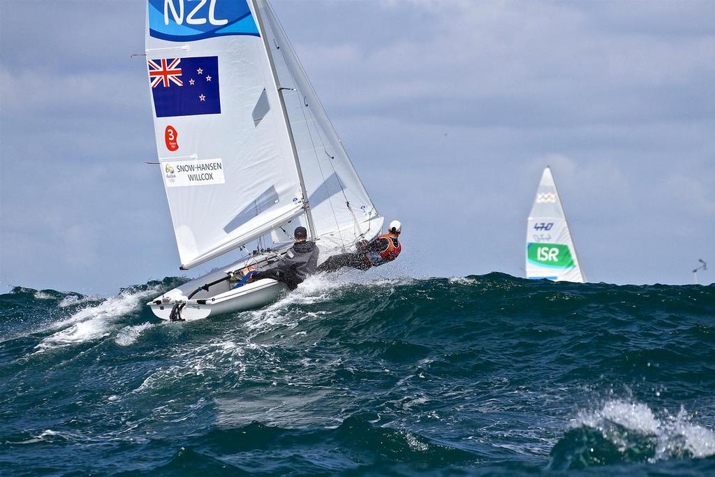 Paul Snow-Hansen and Dan Willcox sailing in 3-4 metre swells and 25kt winds on Day 4 of the 2016 Summer Olympics photo copyright Richard Gladwell www.photosport.co.nz taken at  and featuring the  class