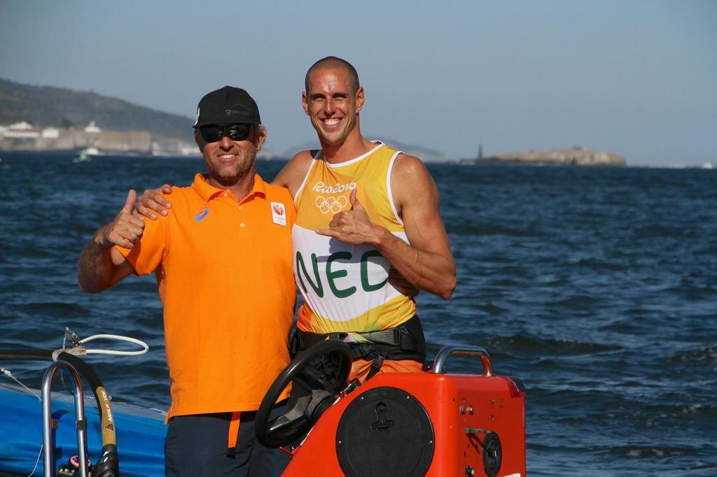Day 7 - RS:X Mens August 14, 2016. Medal race. Olympic Gold medalist, Dorian van Rijsselberghe (NED) with coach Aaron Mcintosh (NZL) photo copyright Richard Gladwell www.photosport.co.nz taken at  and featuring the  class