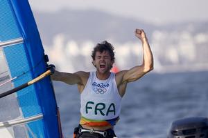Pierre Le Coq claims a memorable bronze - RS:X Men - Rio 2016 Olympic Games photo copyright  Jesus Renedo http://www.sailingstock.com taken at  and featuring the  class