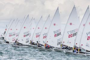 First race start for the A-fleet in the qualification round for the KBC Laser Radial World Championships being hosted by the Royal St. George Yacht Club and Dun Laoghaire Harbour.
 photo copyright David Branigan - Oceansport.ie taken at  and featuring the  class