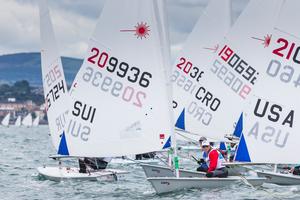 Switzerland's Nicolas Rolaz competing in the opening race of the KBC Laser Radial World Championships being hosted by the Royal St. George Yacht Club and Dun Laoghaire Harbour. photo copyright David Branigan - Oceansport.ie taken at  and featuring the  class