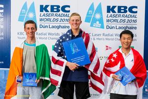 Dun Laoghaire Harbour, Saturday 30th July 2016:
Laser Radial Youth World Champion Henry Marshall, United States (centre) with Ewan McMahon, Ireland (left) and Bernie Chin, Singapore (right) at the prize-giving for the KBC Laser Radial World Championships hosted by the Royal St. George Yacht Club and Dun Laoghaire Harbour.
Photograph:  David Branigan/Oceansport photo copyright David Branigan/Oceansport http://www.oceansport.ie/ taken at  and featuring the  class