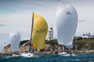 Daniel, Herzliya (Team Israel), Marc Alperovitch's JPK 1080, Timeline (France Red) and Rod Stuart & Bill Ram's Corby 37, Aurora (Celtic Team) pass St Catherine's Lighthouse on the south side of the Isle of Wight - Brewin Dolphin Commodores' Cup - 29 July, 2016 photo copyright  Paul Wyeth / RORC taken at  and featuring the  class