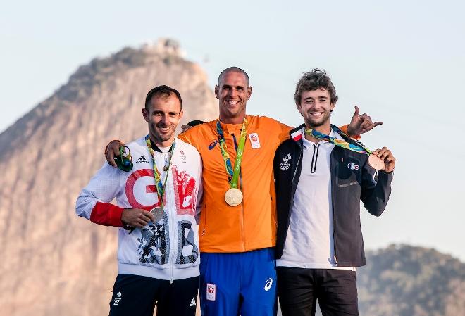 Nick Dempsey (GBR), Dorian van Rijsselberge (NED) and Pierre Le Coq (FRA) celebrate their victories in RS:X Men at the Rio 2016 Olympic Sailing Competition © Sailing Energy / World Sailing