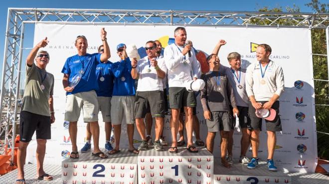 2016 Melges 20 World Champion Michael Illbruck and his Pinta team proudly accept the title trophy, alongside of runner-up Drew Freides on Pacific Yankee (left) and third place Krzysztof Krempec's Mag Tiny (right). - 2016 Melges 20 World Championship - 28 August, 2016 © Barracuda Communication