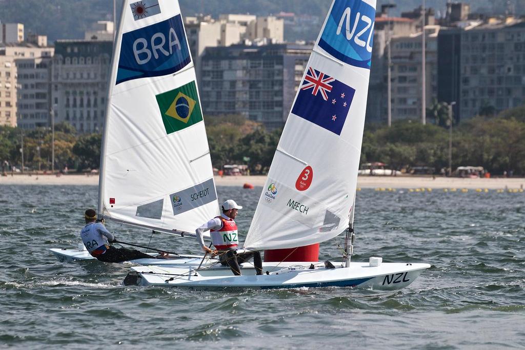 Sam Meech (NZL)  rounds the leeward mark, chasing medal race leader, Robert Scheidt (BRA) in the Medal Race of the Mens Laser - 2016 Olympic sailing Regatta photo copyright Richard Gladwell www.photosport.co.nz taken at  and featuring the  class