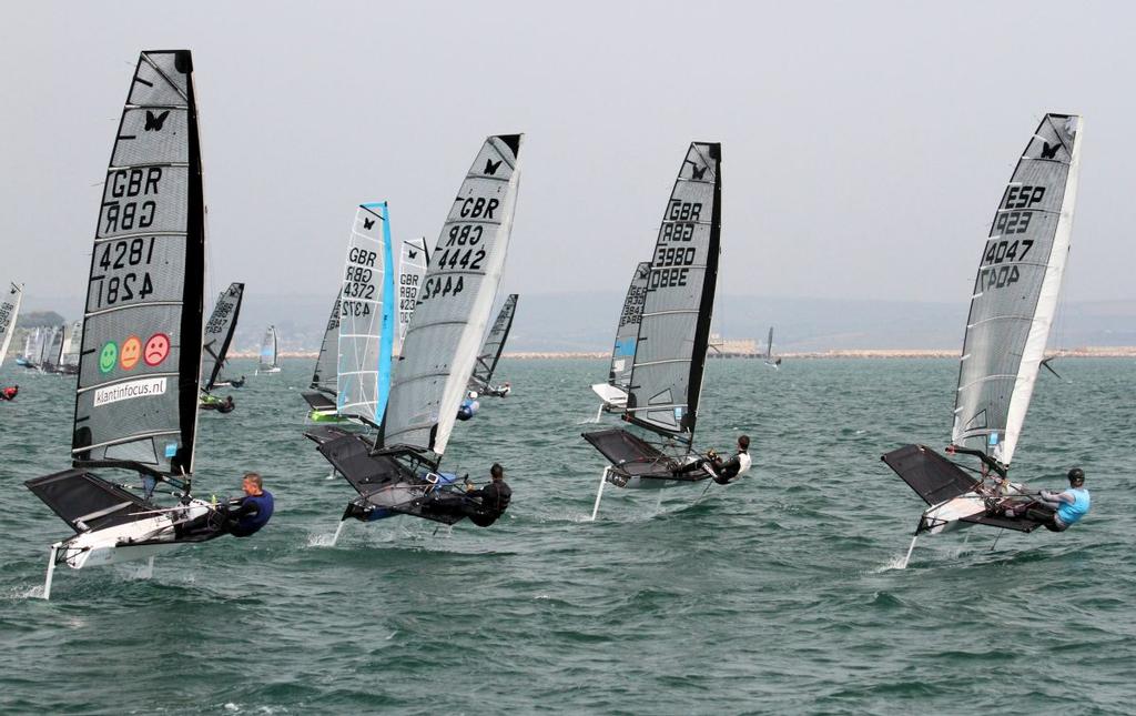 Upwind on day 1 of the VRsport.tv UK Moth Nationals in Weymouth photo copyright Mark Jardine / IMCAUK taken at  and featuring the  class