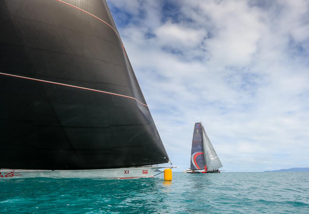 Wild Oats XI crosses the finish line just astern of Scallywag - Race 2- Audi Hamilton Island Race Week photo copyright Michael Chittenden  taken at  and featuring the  class
