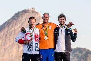 Nick Dempsey (GBR), Dorian van Rijsselberge (NED) and Pierre Le Coq (FRA) celebrate their victories in RS:X Men at the Rio 2016 Olympic Sailing Competition photo copyright Sailing Energy / World Sailing taken at  and featuring the  class