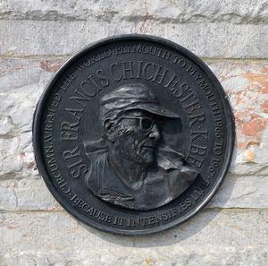 The new bronze plaque commemorating Sir Francis Chichester's pioneering solo circumnavigation set in the wall of the Waterfront Restaurant to replace the one washed away during a winter storm in 2014. photo copyright Barry Pickthall / PPL taken at  and featuring the  class