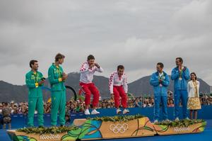 Sime Fantela and Igor Marenic (CRO) arrive on the podium for their gold medals - Rio 2016 Olympic Sailing Competition photo copyright Matias Capizzano http://www.capizzano.com taken at  and featuring the  class