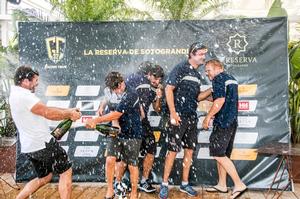 The NORAUTO crew getting sprayed - GC32 La Reserva de Sotogrande Cup photo copyright Jesus Renedo / GC32 Racing Tour taken at  and featuring the  class
