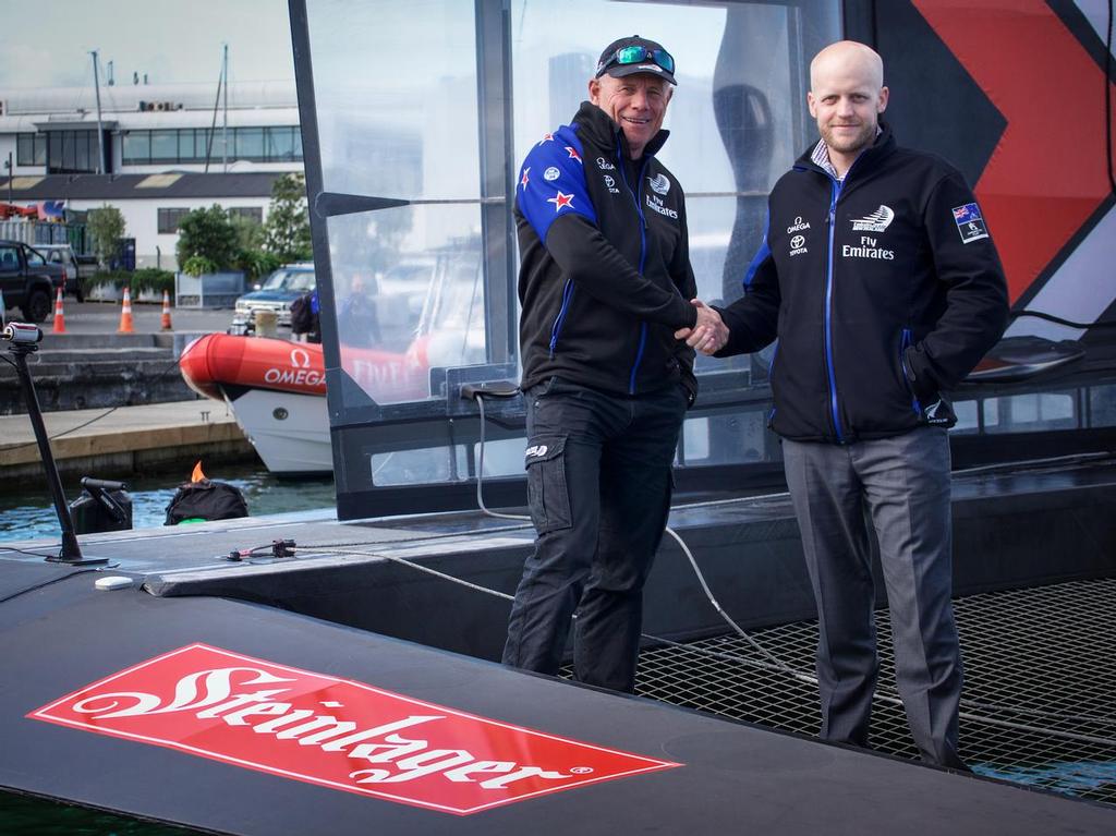 Emirates Team New Zealand CEO Grant Dalton and Lion Marketing Director Ben Wheeler shake hands on the announcement of Steinlager rejoining the team as a sponsor for the 2017 America's Cup photo copyright Hamish Hooper/Emirates Team NZ http://www.etnzblog.com taken at  and featuring the  class