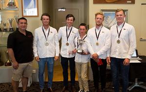 Sharp’s Ed Gaete presents the Australian Youth Match Racing Championship cup to the champions photo copyright CYCA Hamish Hardy taken at  and featuring the  class