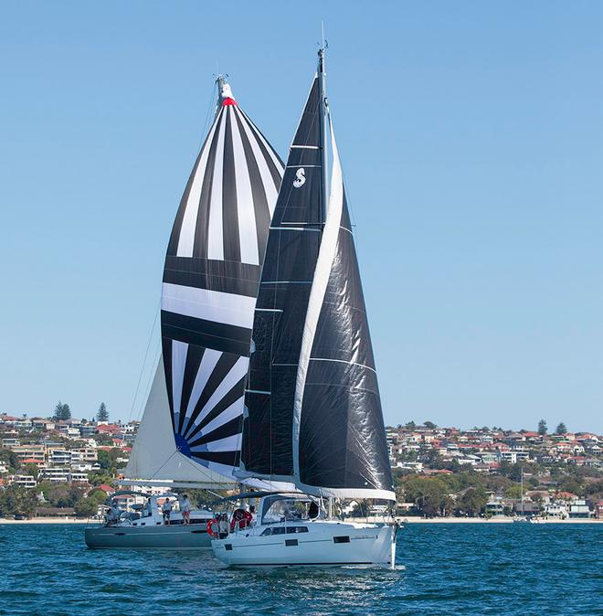The new Oceanis 41.1, Escape, with Antipodes Australis under kite behind her. - 25th Beneteau Cup ©  John Curnow