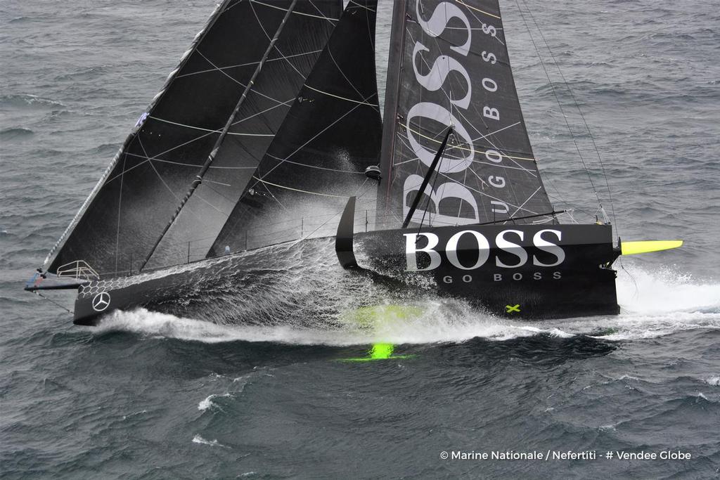Hugo Boss, skipper Alex Thomson (GBR), off the Kerguelen Islands, during a flyover by the National French Marine Nivose Frigate, during the Vendee Globe, solo sailing race around the world, on November 30th, 2016 photo copyright Marine Nationale / Nefertiti / Vendee Globe vendeeglobe.org taken at  and featuring the  class