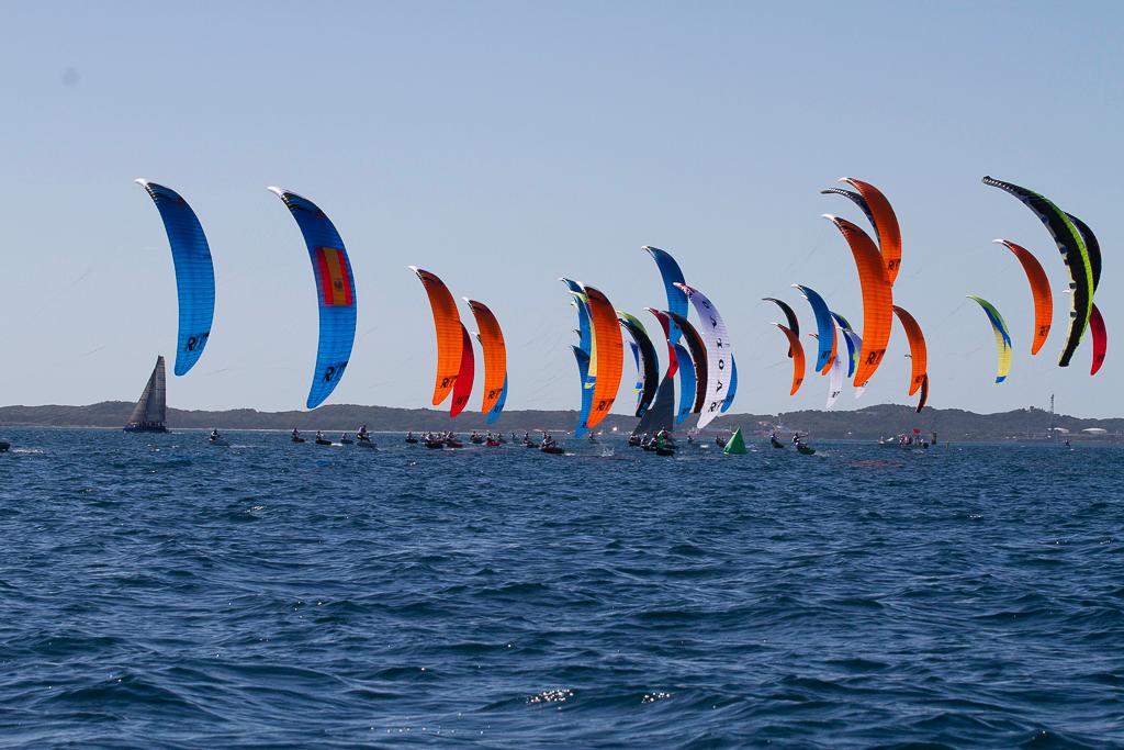 Fifty six riders made a spectacular sight on the start line.  Local ocean racer Walk on the Wild Side forms a backdrop. - Hydrofoil World Pro Tour Final Round © Bernie Kaaks