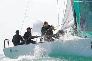 Conor Clarke's Embarr IRL829 with Stuart McNay helming on the ocean waves in Miami - 2016 Melges 24 World Championship - Miami -  Day 2 photo copyright  Pierrick Contin http://www.pierrickcontin.fr/ taken at  and featuring the  class