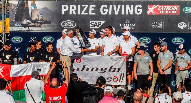 Act 8, Extreme Sailing Series Sydney – Day 4 – Prize giving – Race Director Phil Lawrence hands over the Series trophy to 2016 champions Alinghi. © Jesus Renedo / Lloyd images