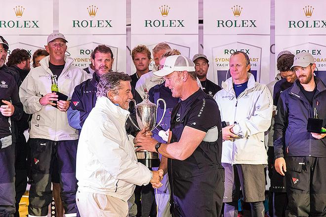 Anthony Bell receives the coveted J.H. Illingworth trophy - Rolex Sydney Hobart Yacht Race © Andrea Francolini