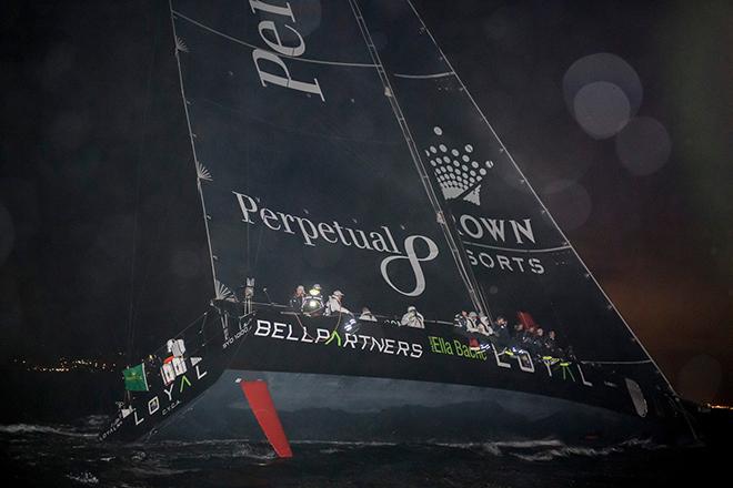 Anthony Bell's Perpetual Loyal crosses the finish line to claim line honours and set a new race record at the Rolex Sydney Hobart ©  Rolex/ Kurt Arrigo http://www.regattanews.com